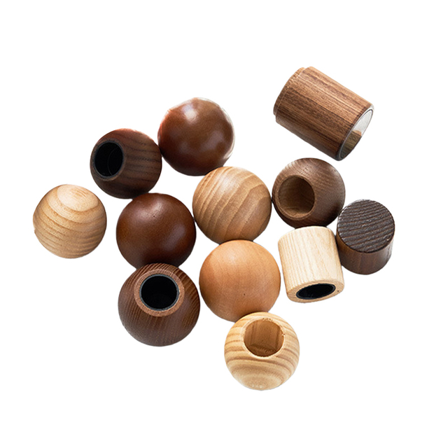 Wooden cap of the perfume bottle